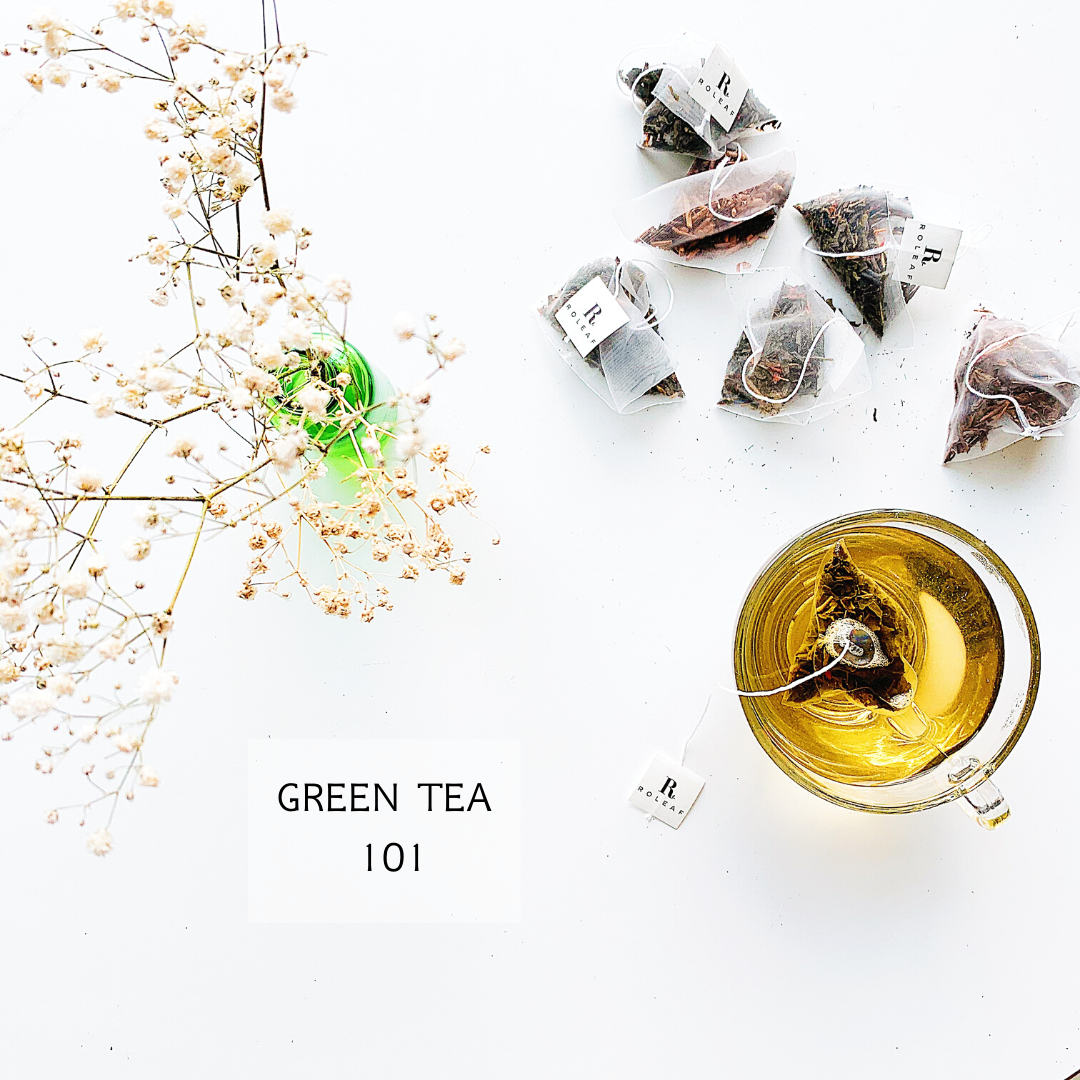 green tea 101 tea bag in cup with flower jar and teabags